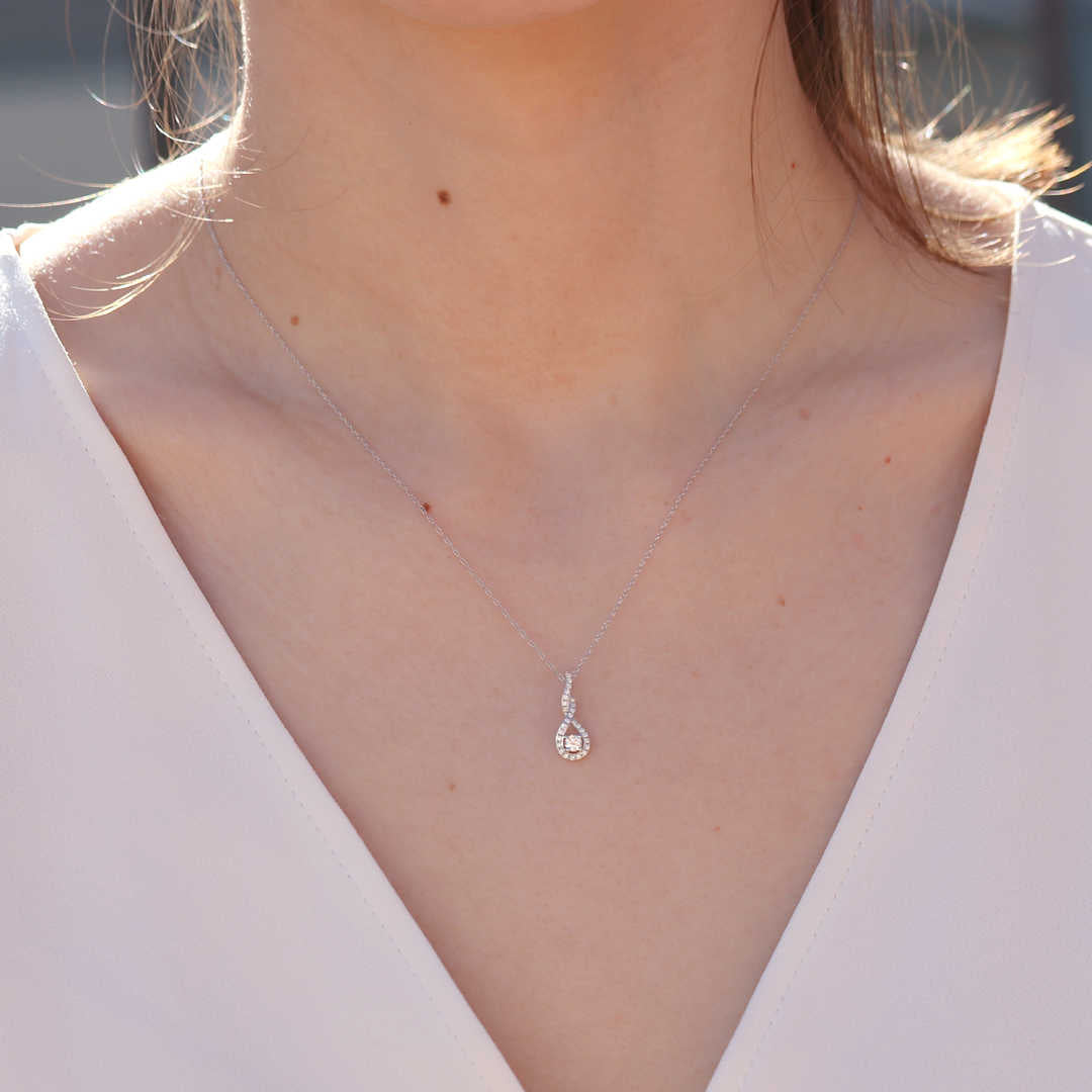 Infinity Twist Halo Diamond Pendant